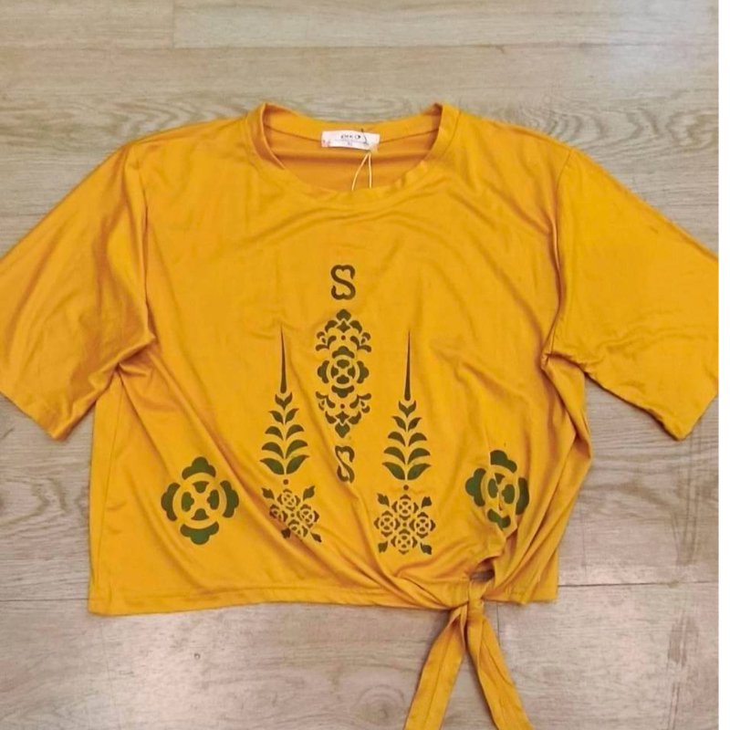 เสื้อยืดพิมพ์ลายด้วยหมึกพิมพ์สีธรรมชาติ
เสื้อยืดผ้าคอตตอน  พิมพ์ลายด้วยหมึกคราม เป็นลายพระราชทานปี68